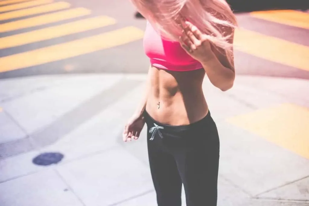 Woman with toned stomach after LA-EMS Body Sculpting Treatment Sidcup